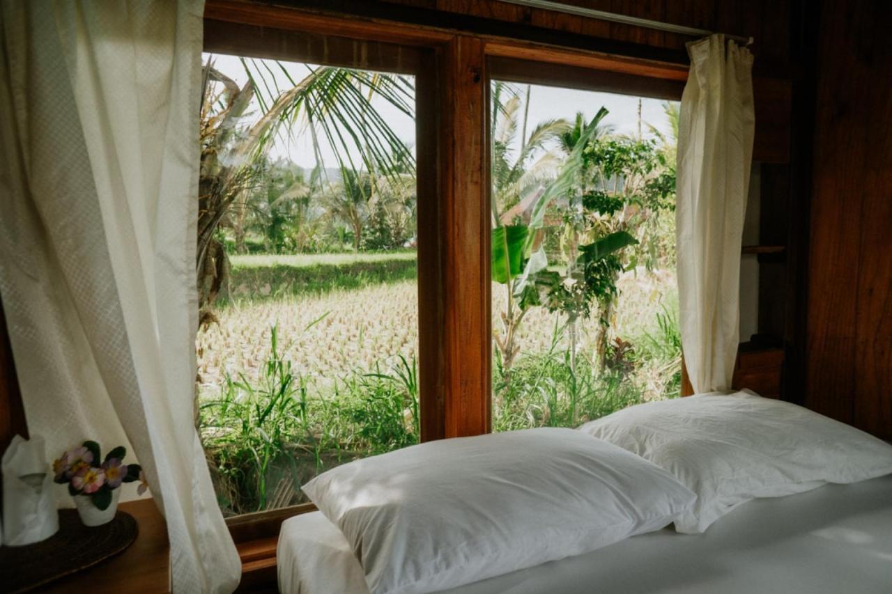 Puri Sunny Camp Villa มุนดุก ภายนอก รูปภาพ